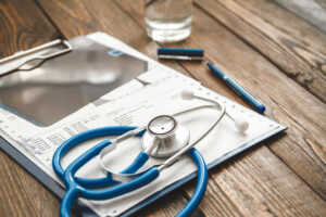 hospital doctor patient sheet with stethoscope.